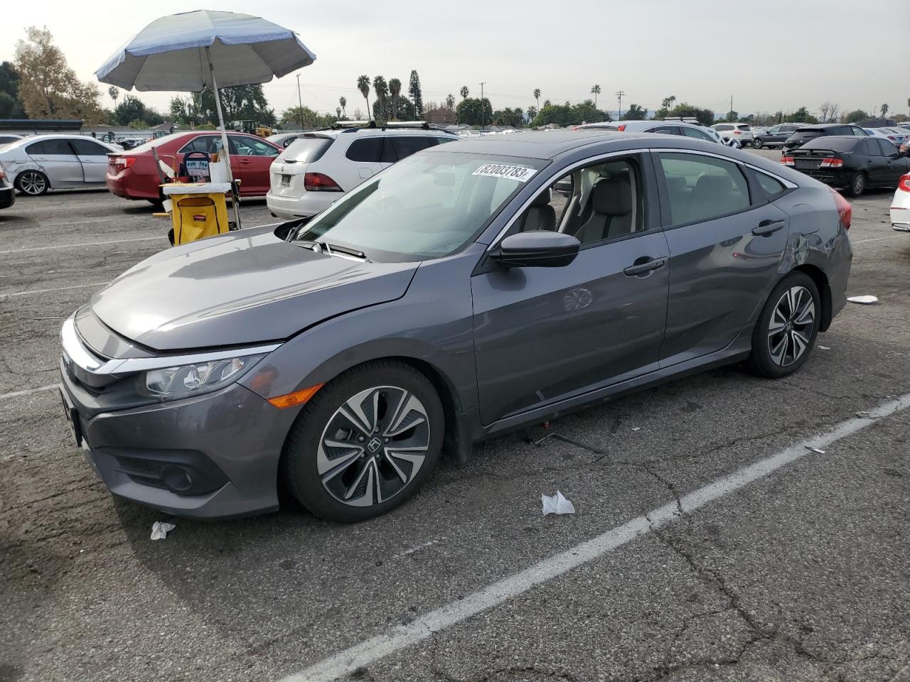 Obraz 1 z 2018 HONDA CIVIC EX 2018 z VIN JHMFC1F30JX040837