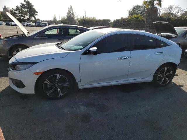 Obraz 1 z 2016 HONDA CIVIC TOURING 2016 z VIN 2HGFC1F96GH645000