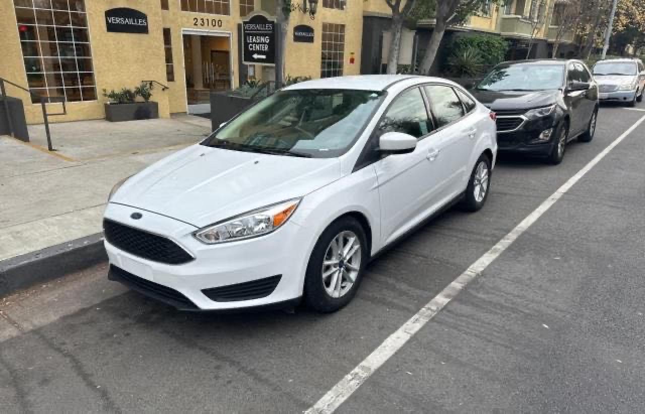 Изображение 2 2018 FORD FOCUS SE 2018 с VIN 1FADP3FE8JL293279