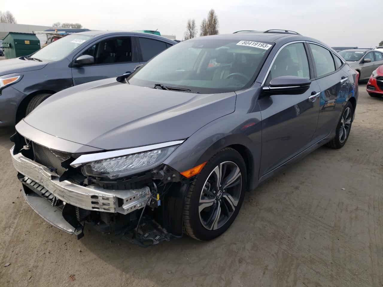 Image 1 of 2018 HONDA CIVIC TOURING 2018 with VIN JHMFC1F9XJX010524