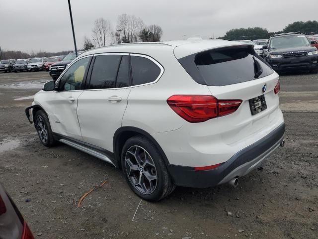 Obraz 2 z 2018 BMW X1 XDRIVE28I 2018 z VIN WBXHT3C34J5K29628