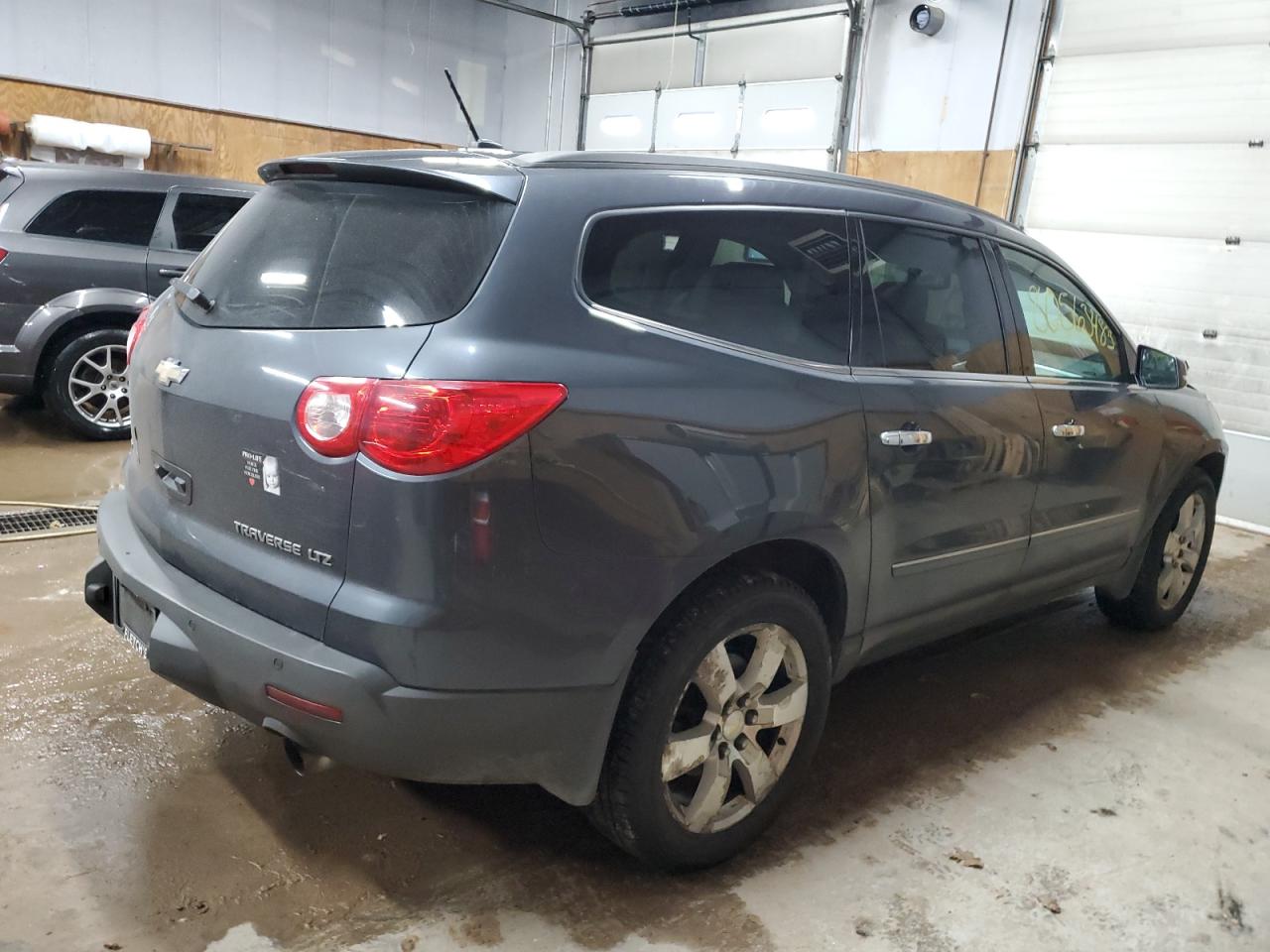 Image 3 of 2011 CHEVROLET TRAVERSE LTZ 2011 with VIN 1GNKVLED4BJ280887
