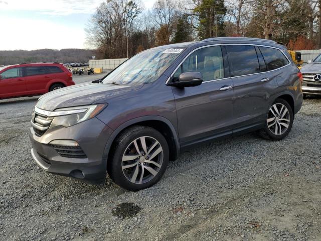 Image 1 of 2017 HONDA PILOT TOURING 2017 with VIN 5FNYF5H98HB033150