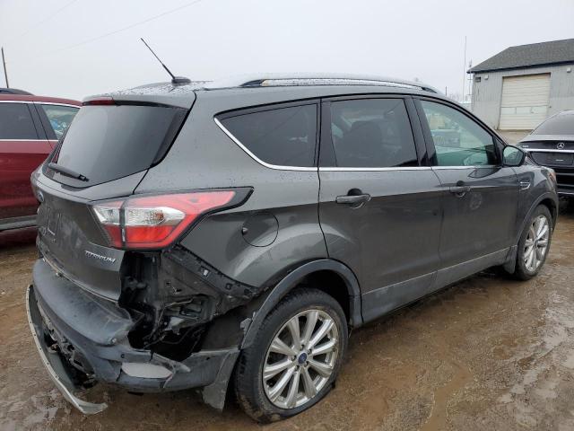 Изображение 3 2017 FORD ESCAPE TITANIUM 2017 с VIN 1FMCU9J97HUB42171