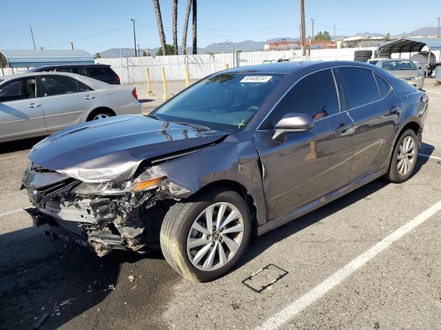Image 1 of 2022 TOYOTA CAMRY LE 2022 with VIN 4T1C11AK9NU678192