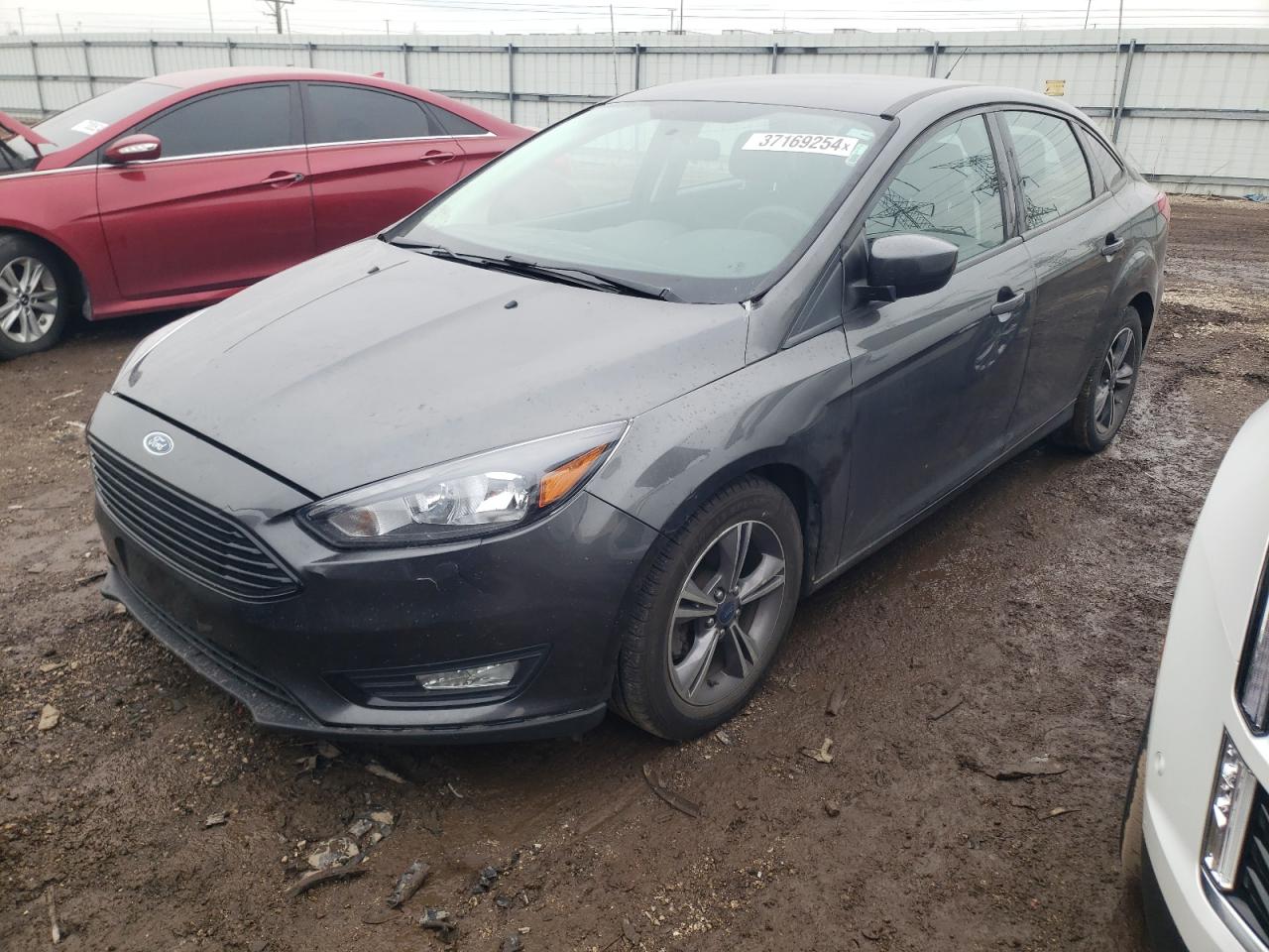 Image 1 of 2018 FORD FOCUS SE 2018 with VIN 1FADP3FE5JL260000