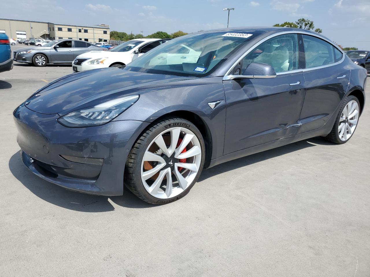Изображение 1 Tesla Model 3 2018 с VIN 5YJ3E1EB9JF079444