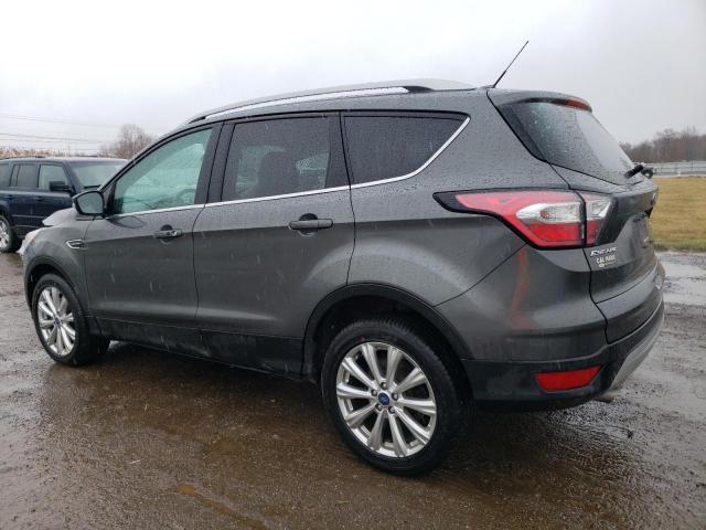 Obraz 2 z 2017 FORD ESCAPE TITANIUM 2017 z VIN 1FMCU9J97HUD37512