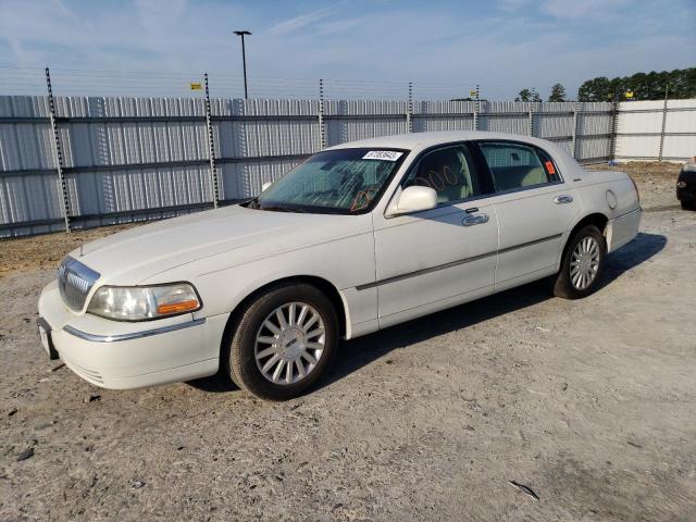Obraz 1 z 2003 LINCOLN TOWN CAR SIGNATURE 2003 z VIN 1LNHM82W33Y704072