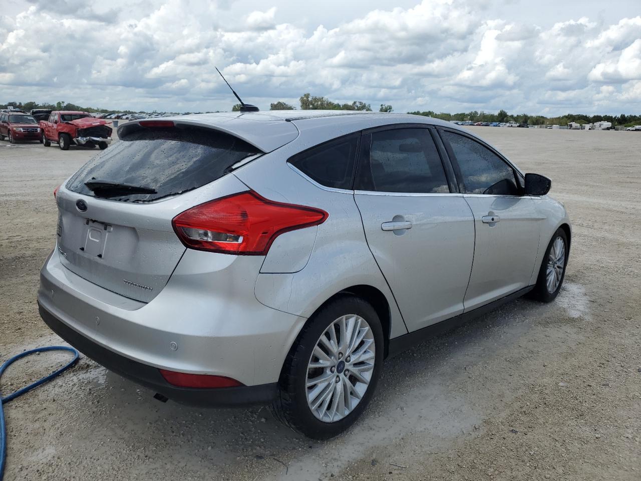 Obraz 3 z 2015 FORD FOCUS TITANIUM 2015 z VIN 1FADP3N25FL229120