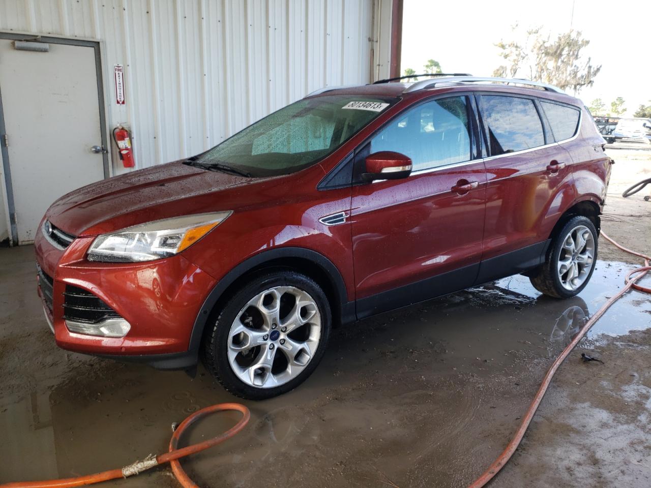 Image 1 of 2014 FORD ESCAPE TITANIUM 2014 with VIN 1FMCU9J96EUB00084