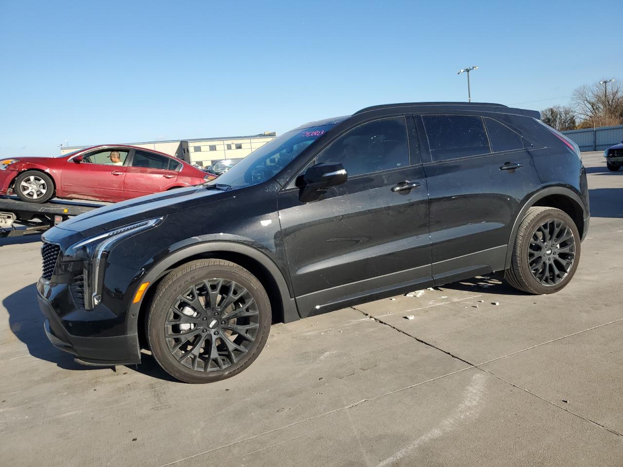 Image 1 of 2023 CADILLAC XT4 SPORT 2023 with VIN 1GYFZER46PF107025