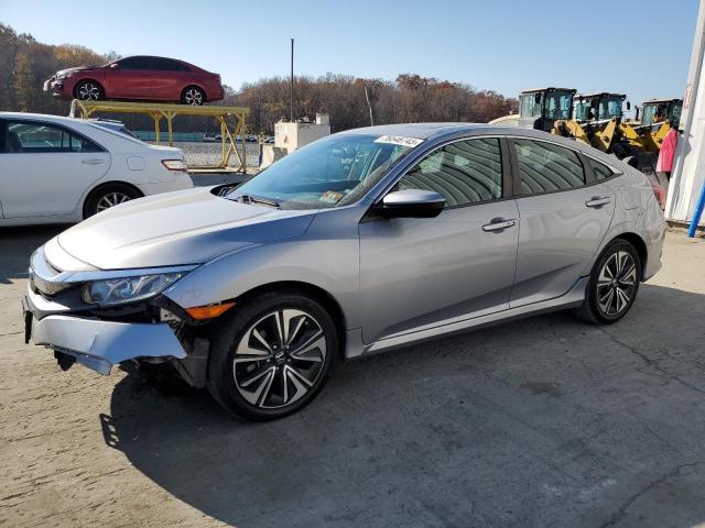 Obraz 1 z 2017 HONDA CIVIC EX 2017 z VIN 19XFC2F76HE227178