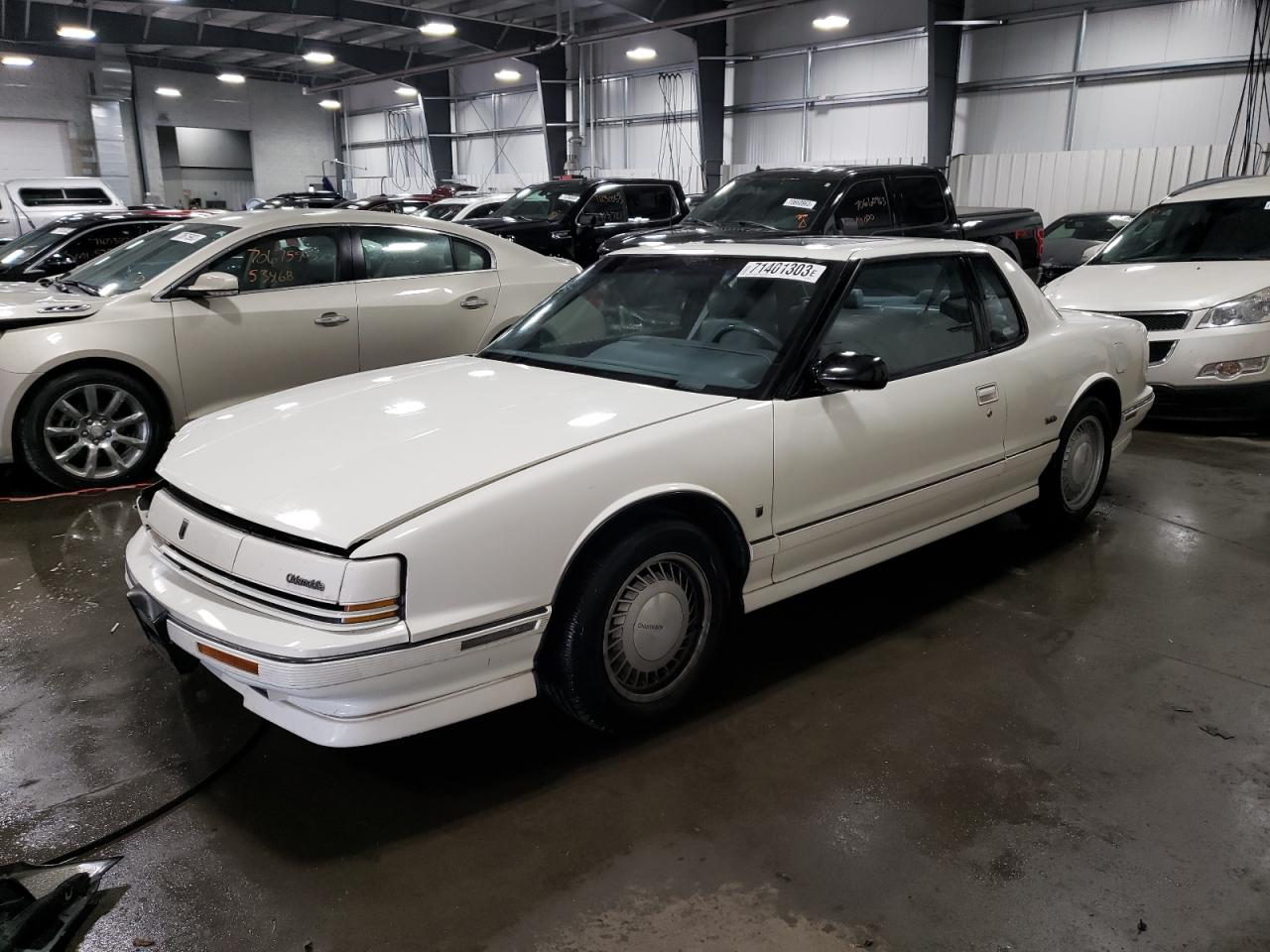 Obraz 1 z 1990 OLDSMOBILE TORONADO TROFEO 1990 z VIN 1G3EV13C3LU310515