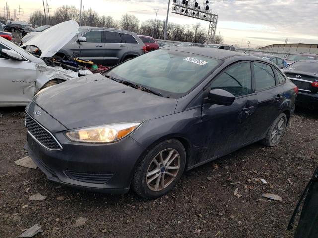 Image 1 of 2018 FORD FOCUS SE 2018 with VIN 1FADP3F27JL212777