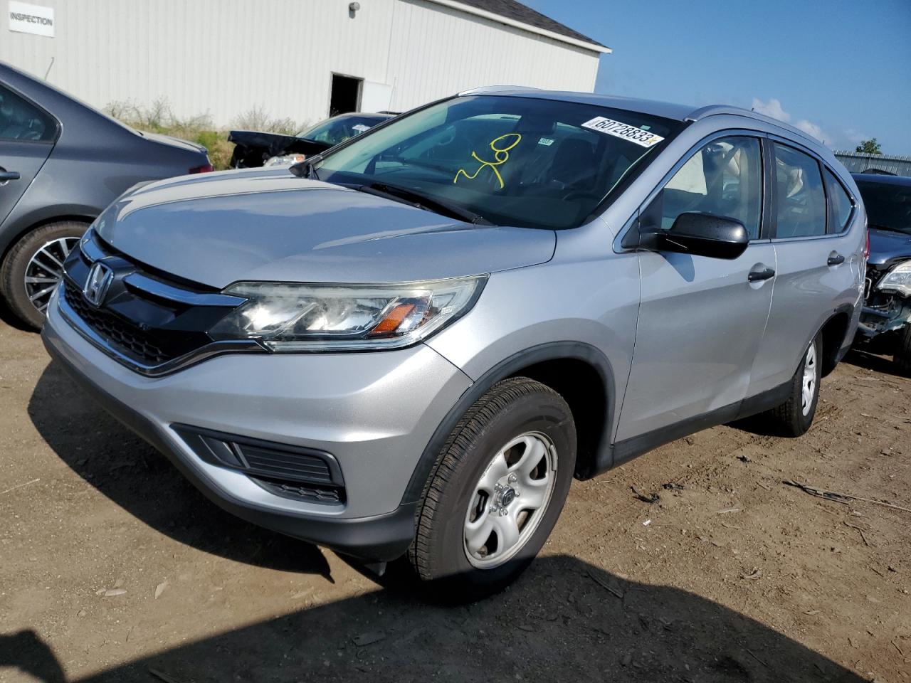 Obraz 1 z 2015 HONDA CR-V LX 2015 z VIN 5J6RM4H36FL034365
