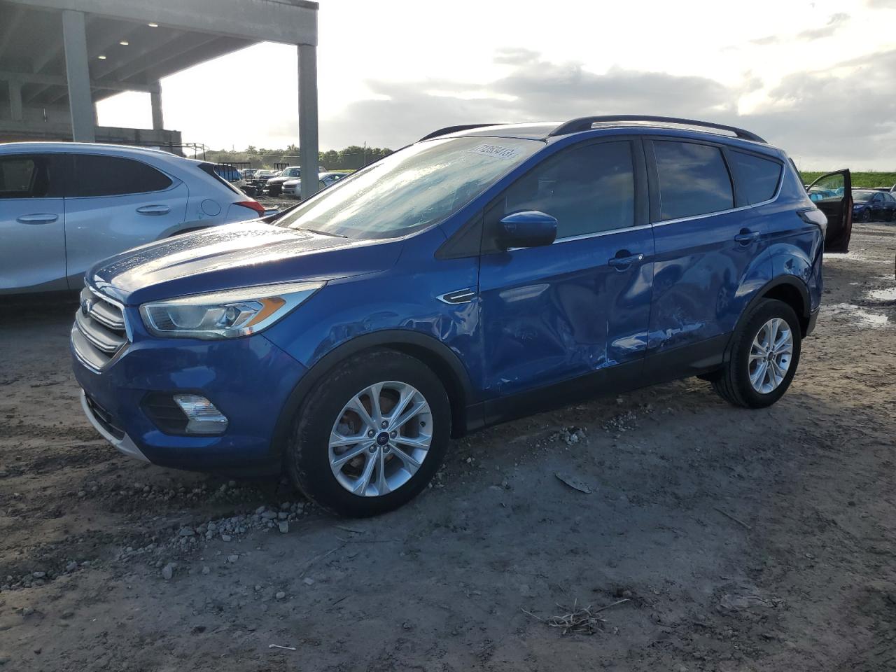 Obraz 1 z 2017 FORD ESCAPE SE 2017 z VIN 1FMCU0GD7HUC60163