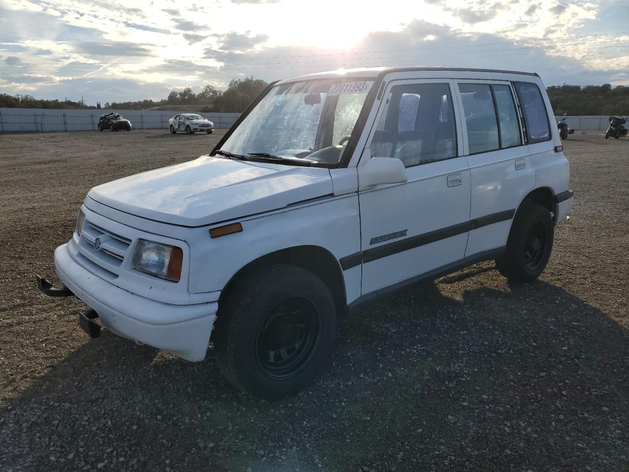 Изображение 1 1998 SUZUKI SIDEKICK JX 1998 с VIN 2S3TD03V2W6400183