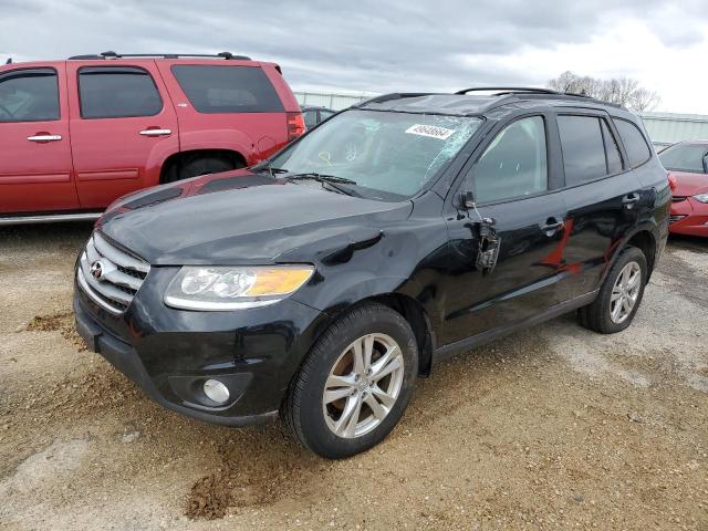 Image 1 of 2012 HYUNDAI SANTA FE SE 2012 with VIN 5XYZHDAG1CG130886