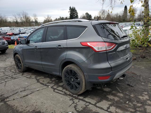 Изображение 2 2016 FORD ESCAPE TITANIUM 2016 с VIN 1FMCU9J90GUB83689