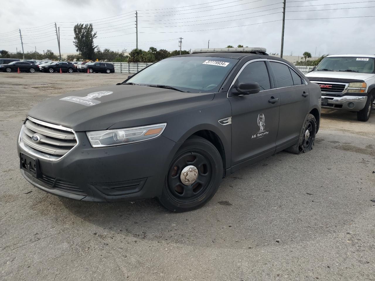 Image 1 of 2013 FORD TAURUS POLICE INTERCEPTOR 2013 with VIN 1FAHP2M88DG116897