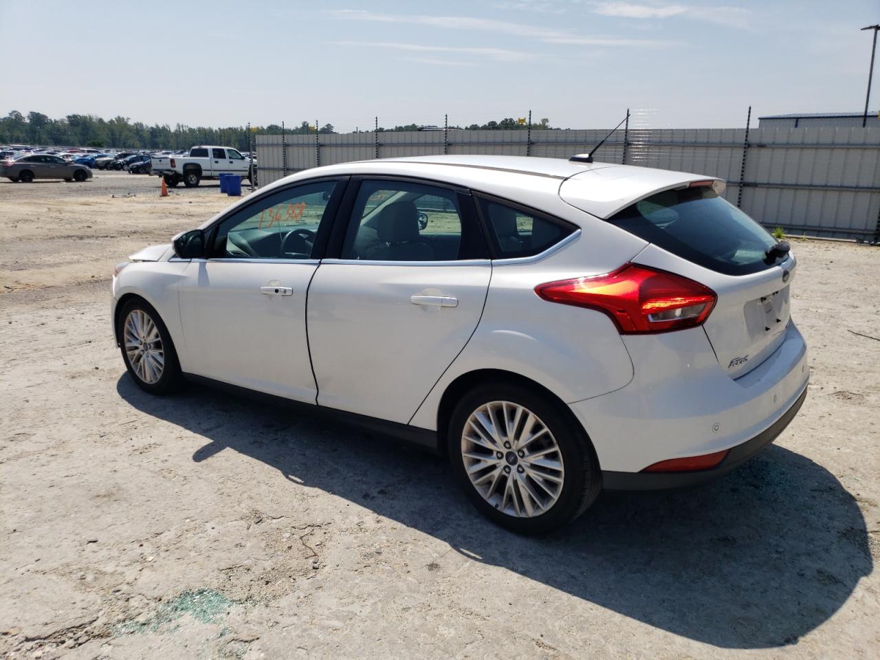 Image 2 of Ford Focus Titanium 2016 with VIN 1FADP3N23GL222975