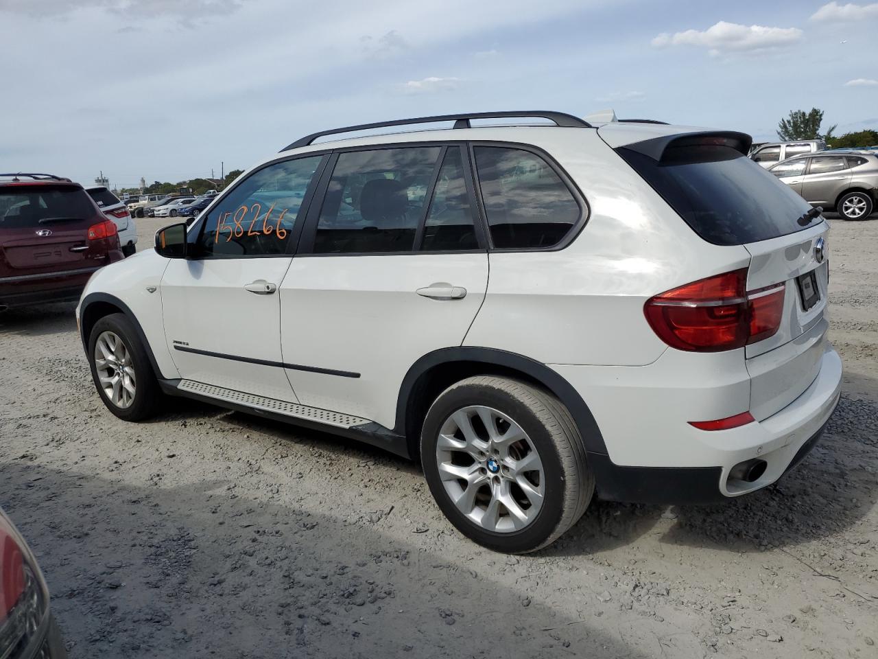 Изображение 2 2012 BMW X5 XDRIVE35I 2012 с VIN 5UXZV4C52CL988178
