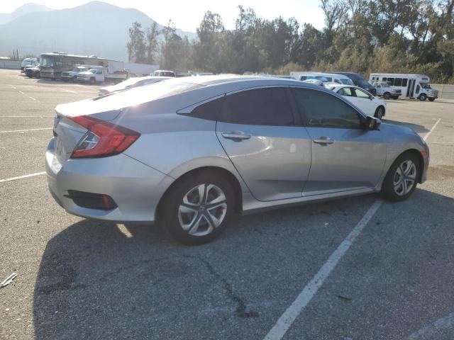 Image 3 of 2018 HONDA CIVIC LX 2018 with VIN 19XFC2E59JE016028