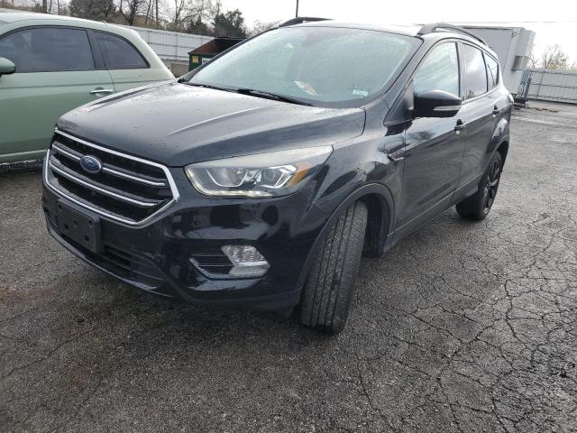 Obraz 1 z 2017 FORD ESCAPE TITANIUM 2017 z VIN 1FMCU9JD4HUD19019