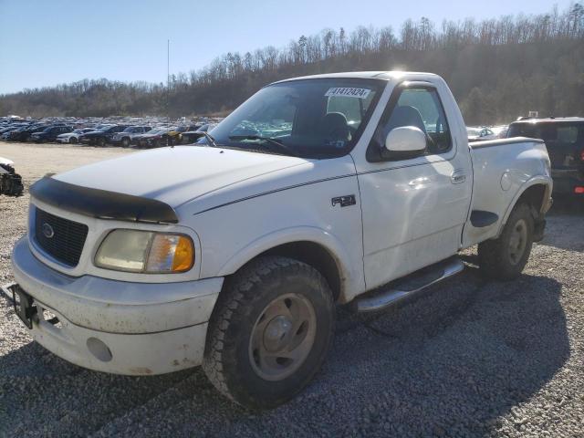 Obraz 1 z 2003 FORD F150  2003 z VIN 2FTRF08243CA73509