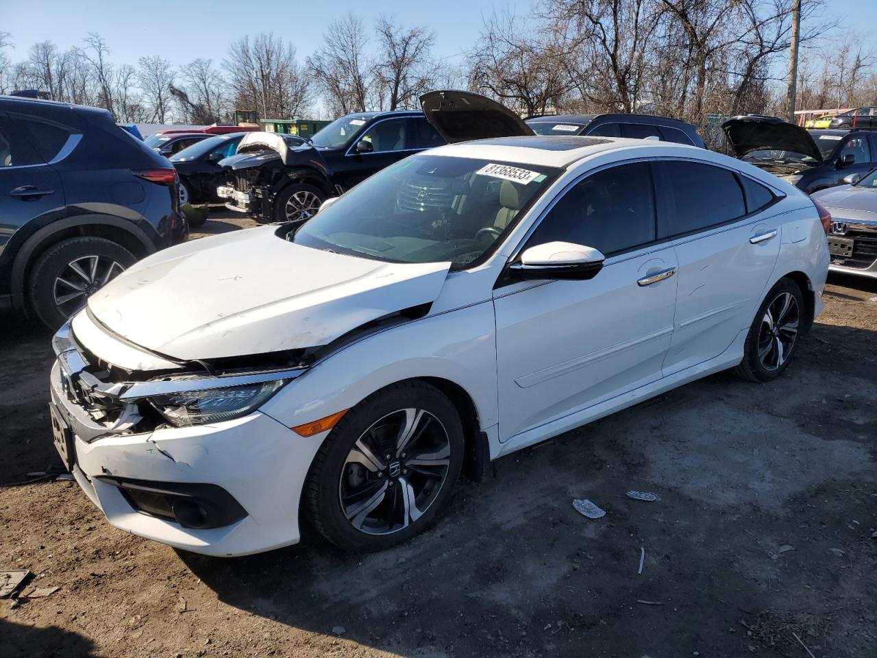 Image 1 of 2016 HONDA CIVIC TOURING 2016 with VIN 2HGFC1F99GH635657