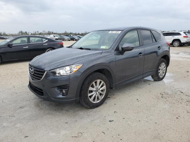 Image 1 of 2016 MAZDA CX-5 TOURING 2016 with VIN JM3KE4CY6G0651489