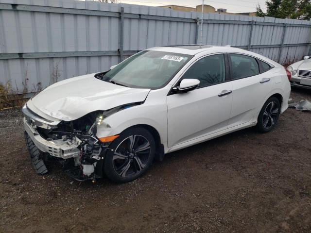 Obraz 1 z 2018 HONDA CIVIC TOURING 2018 z VIN 2HGFC1F98JH104117