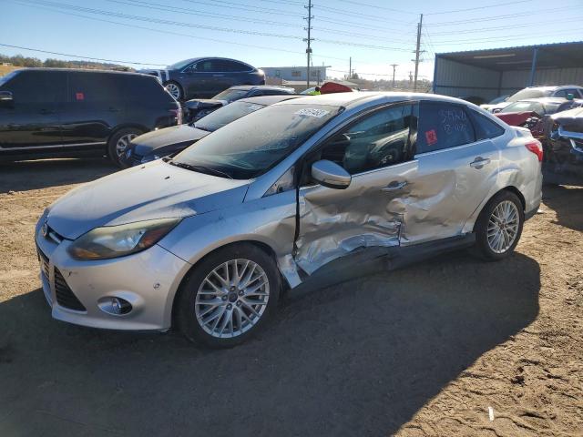 Obraz 1 z 2013 FORD FOCUS TITANIUM 2013 z VIN 1FADP3J2XDL380991