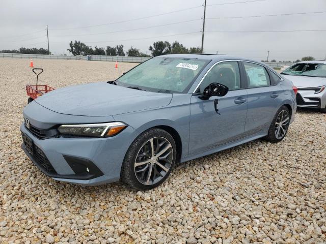 Obraz 1 z 2023 HONDA CIVIC TOURING 2023 z VIN 2HGFE1F90PH323222