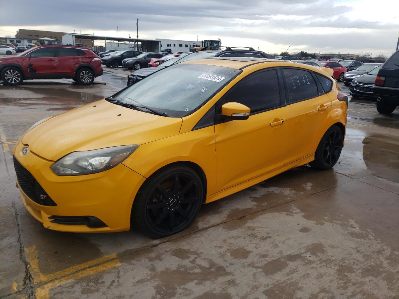 Image 1 of 2013 FORD FOCUS ST 2013 with VIN 1FADP3L92DL196946