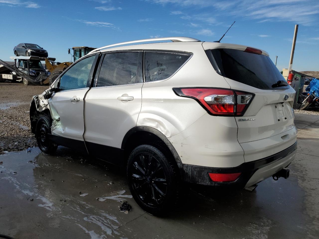 Изображение 2 2017 FORD ESCAPE TITANIUM 2017 с VIN 1FMCU9J91HUC25823