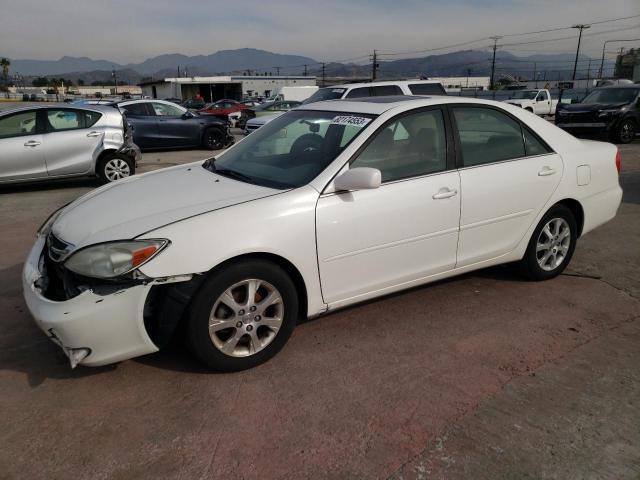 Obraz 1 z 2004 TOYOTA CAMRY LE 2004 z VIN JTDBE32KX40263631