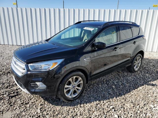 Image 1 of 2018 FORD ESCAPE SE 2018 with VIN 1FMCU9GD8JUB76329
