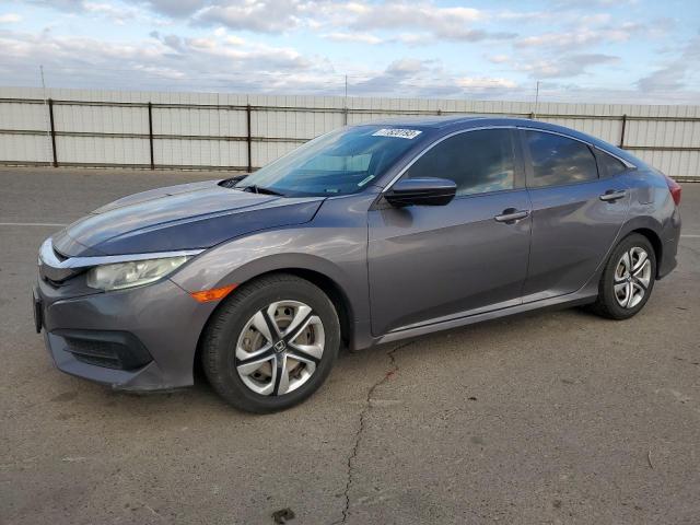 Image 1 of 2018 HONDA CIVIC LX 2018 with VIN 2HGFC2F57JH504835