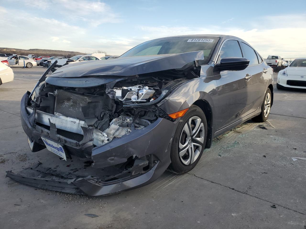 Obraz 1 z 2018 HONDA CIVIC LX 2018 z VIN 19XFC2F56JE031598