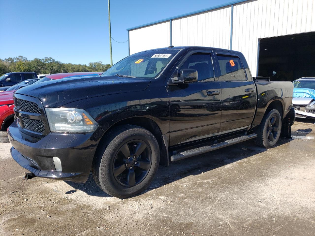 Image 1 of 2014 RAM 1500 ST 2014 with VIN 3C6RR7KTXEG310437