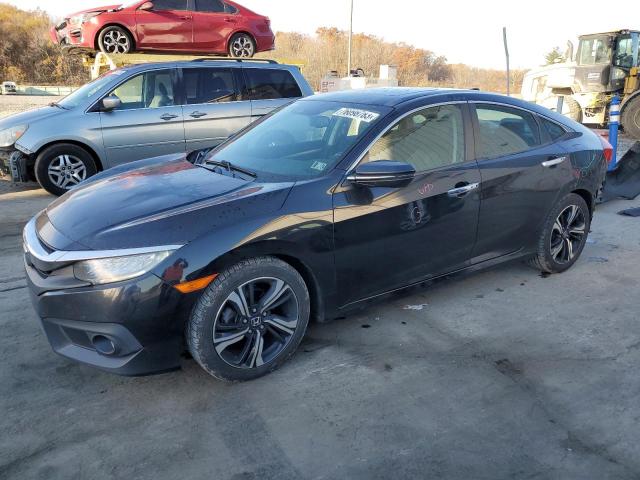 Obraz 1 z 2016 HONDA CIVIC TOURING 2016 z VIN 2HGFC1F9XGH646196