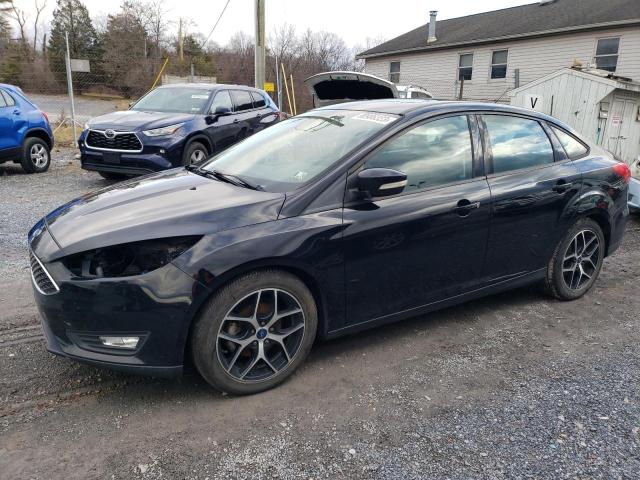 Image 1 of 2017 FORD FOCUS SEL 2017 with VIN 1FADP3H26HL326339