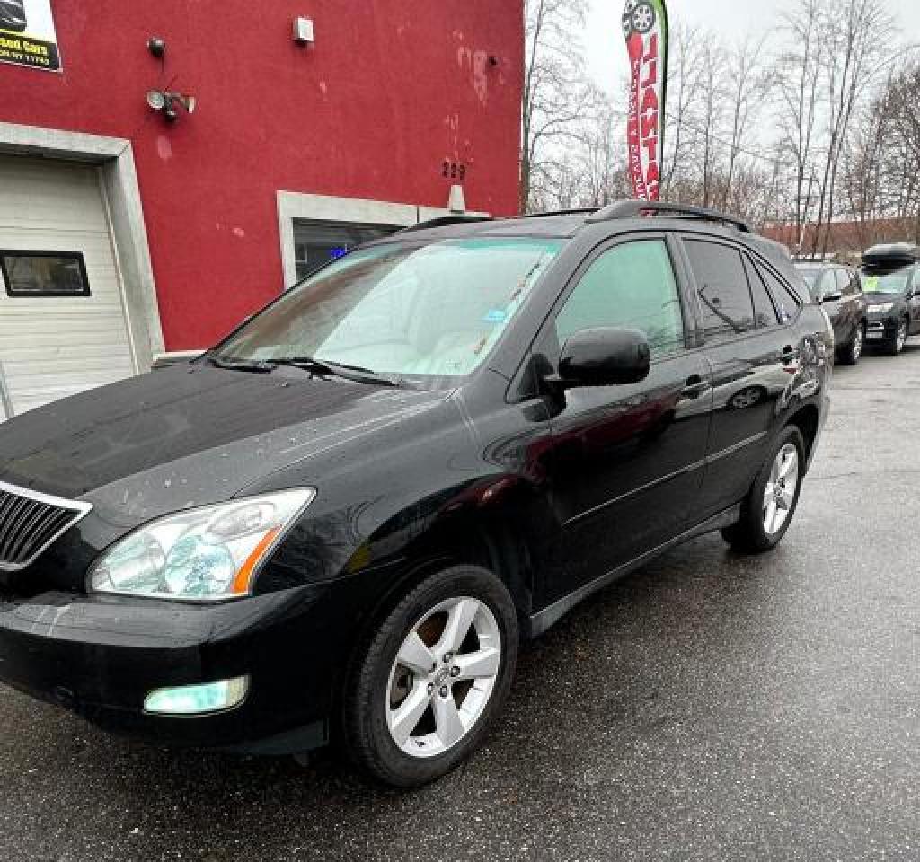Obraz 1 z 2007 LEXUS RX 350 2007 z VIN 2T2GK31U37C004292