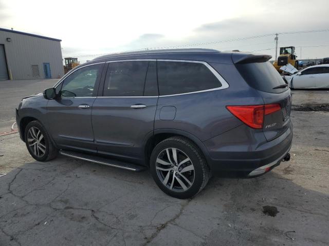 Изображение 2 2018 HONDA PILOT TOURING 2018 с VIN 5FNYF6H97JB010003