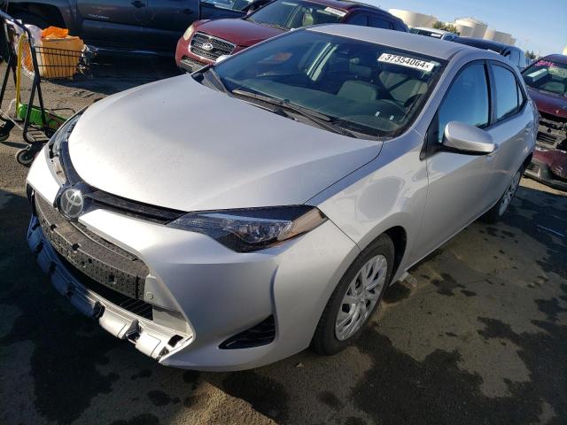 Obraz 1 z 2017 TOYOTA COROLLA L 2017 z VIN 5YFBURHE0HP670859