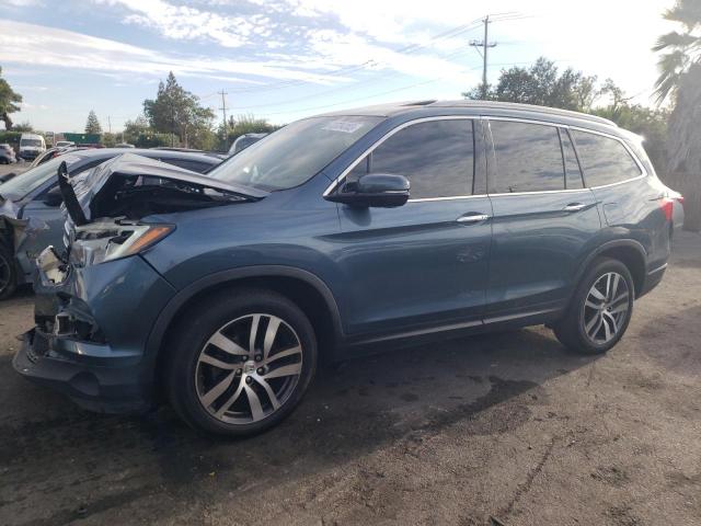 Изображение 1 2018 HONDA PILOT TOURING 2018 с VIN 5FNYF6H90JB041819