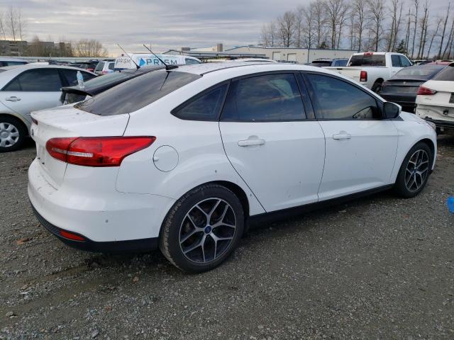 Image 3 of 2017 FORD FOCUS SE 2017 with VIN 1FADP3FE4HL348515