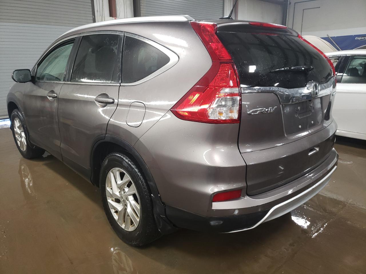 Изображение 2 2015 HONDA CR-V EXL 2015 с VIN 5J6RM4H71FL025429